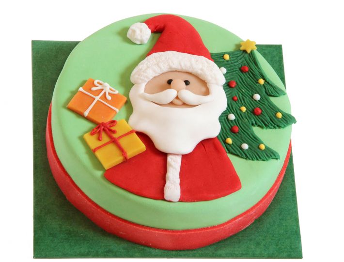 Weihnachtstorte mit Weihnachtsmann und Geschenken