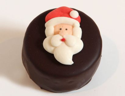 12 Weihnachts-Törtchen mit Weihnachtsmannkopf