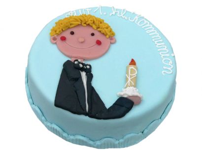 Kommunionstorte mit Junge und Kerze in Blau