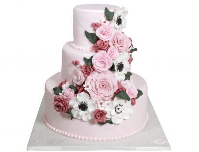 Rosa Traum Hochzeitstorte mit Blütenkaskade